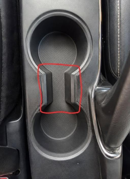 Most Drivers Never Realize What That Small Gap in a Cup Holder Is For